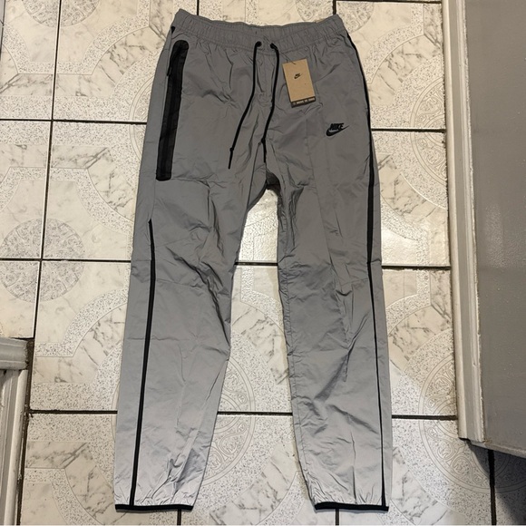 New Nike Tech Woven Flash Reflective Pants Silver Men’s Size Medium FZ7587-035